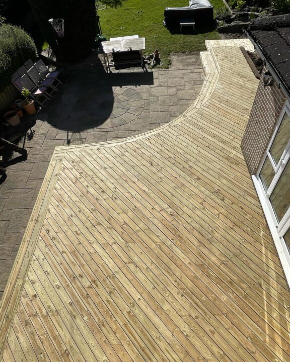 Curved Redwood Softwood Decking Installation – Poole, Dorset - birds eye view