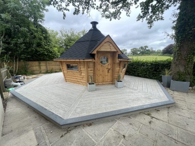 Hexagon Arctic Cabin Decking installation in Millboard Weathered Oak Driftwood – Wimborne, Dorset - after picture