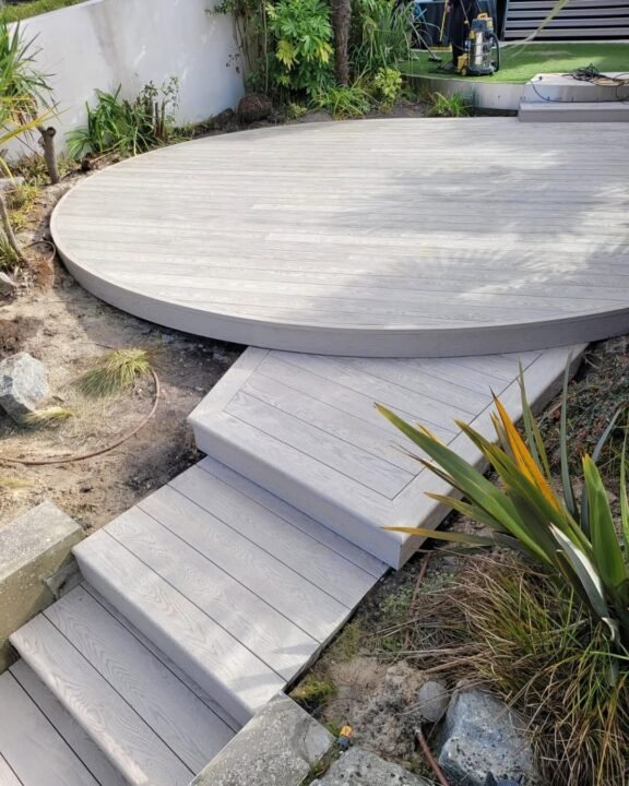 bournemouth-millboard-grey-custom-built-round-deck-ocean-side-1