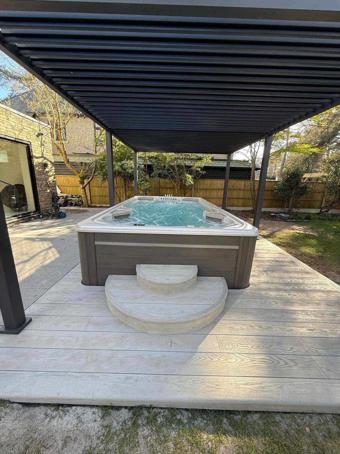 Millboard Smoked oak hot tub decking installation broadstone 5 Millboard Smoked oak hot tub decking installation broadstone 5
