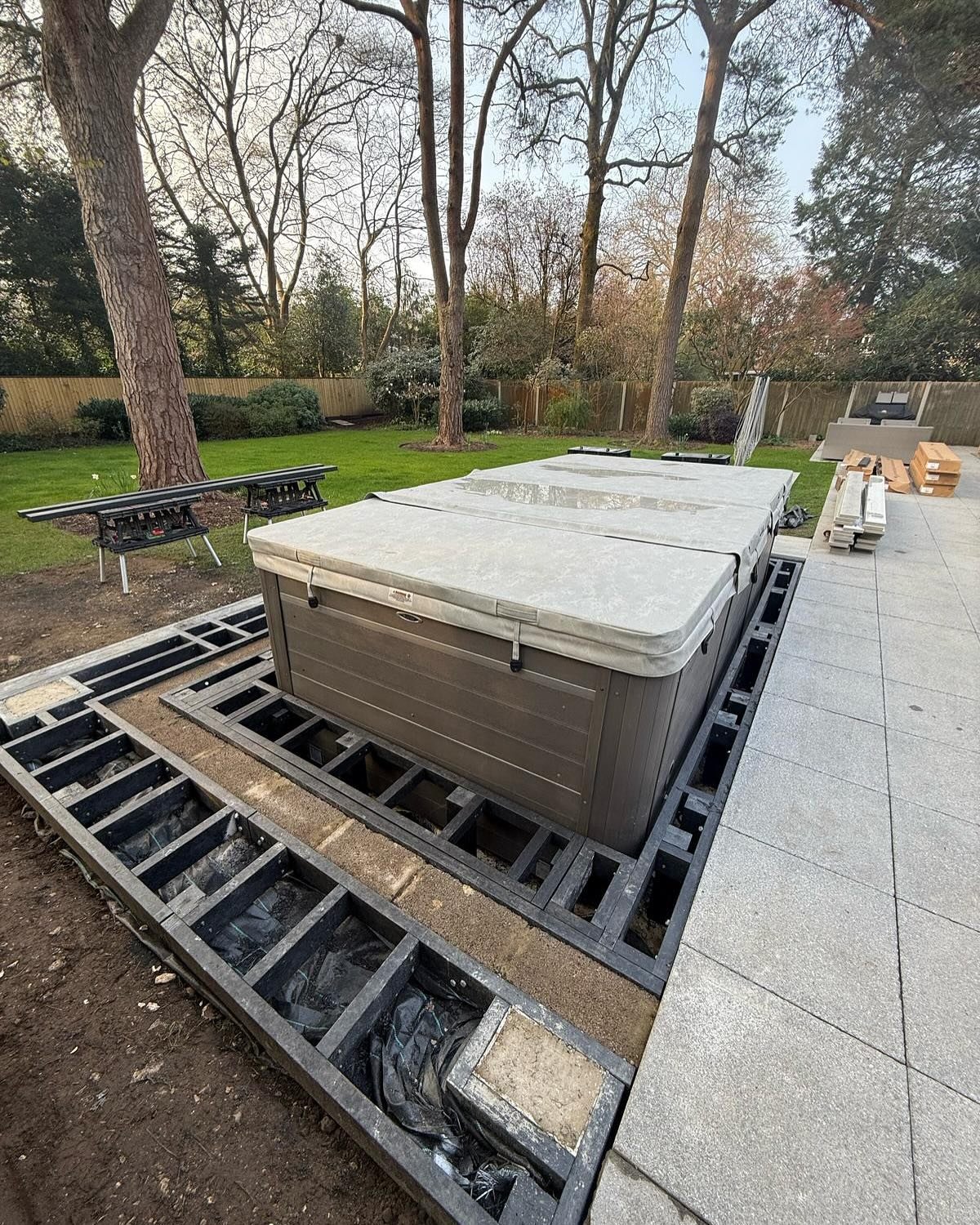 Millboard Smoked oak hot tub decking installation broadstone plaspro sub frame Millboard Smoked oak hot tub decking installation broadstone plaspro sub frame
