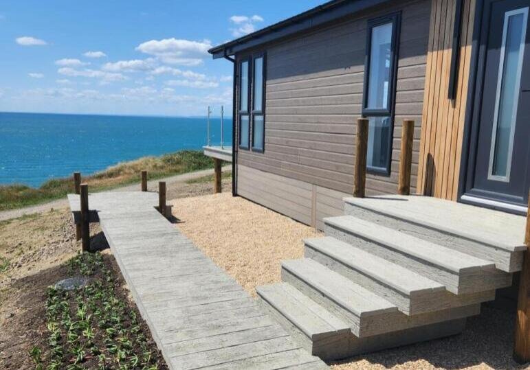 Millboard Weathered oak- Driftwood - west bay bridport decking installation 4 Millboard Weathered oak- Driftwood - west bay bridport decking installation 4